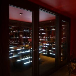 Innovative wooden wine cellar with glass door in the New York area