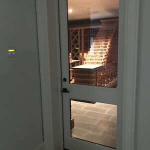 Innovative wine cellar with cooling system and glass door in the New York area